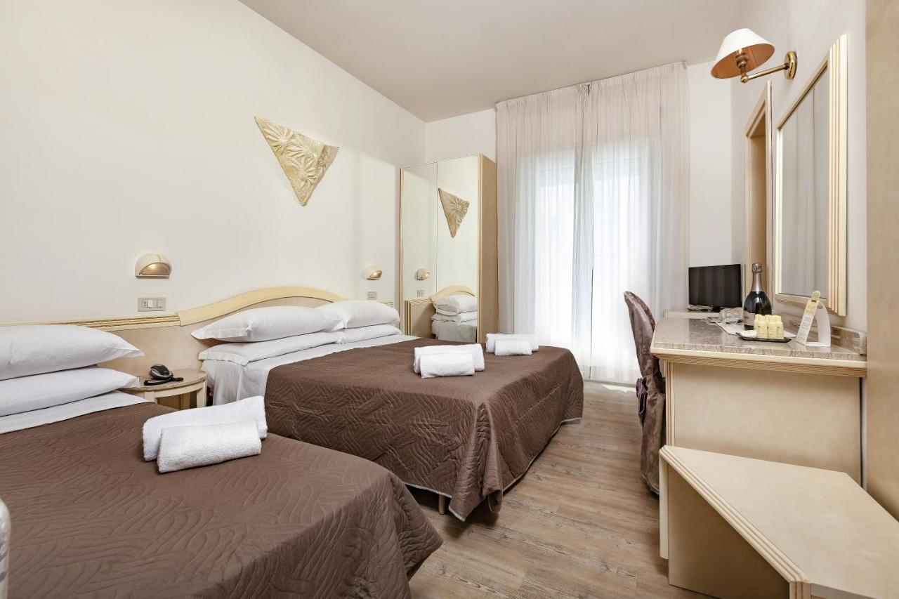 Camera Familiare Tripla con Balcone