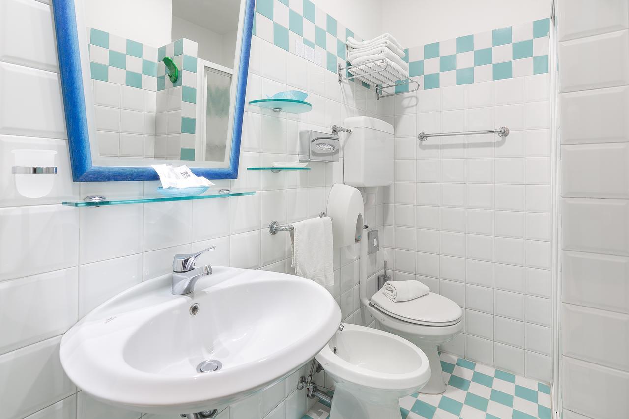 Double or Twin Room with Side Sea View,665887515:JPEG